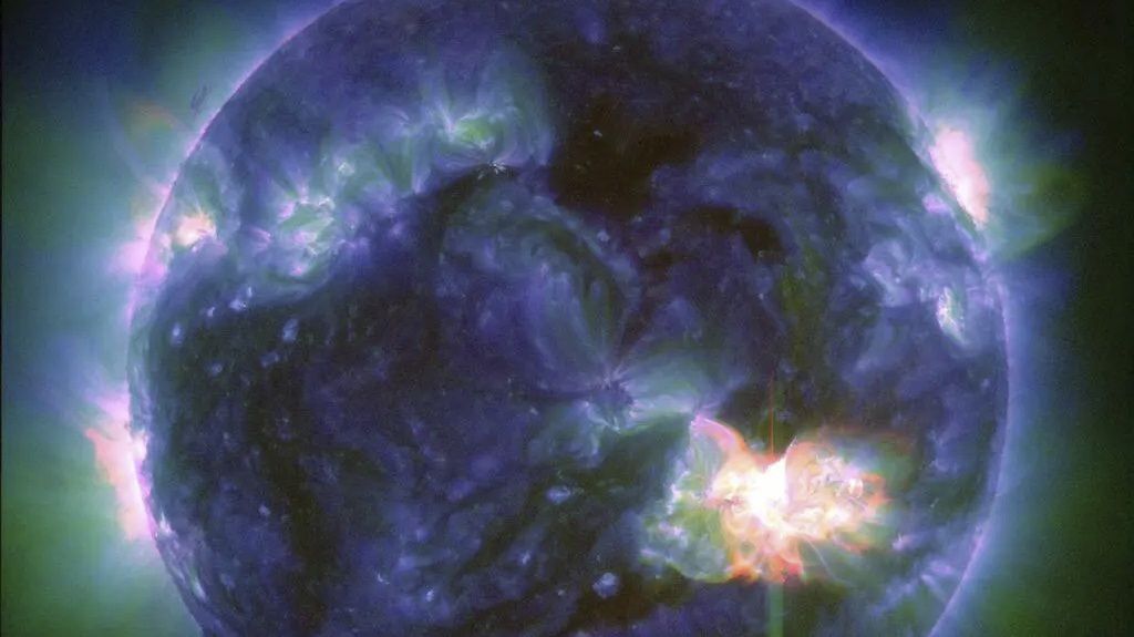 This image provided by NASA shows a solar flare, as seen in the bright flash in the lower right, captured by NASA’s Solar Dynamics Observatory on May 9, 2024. (NASA/SDO via AP)
