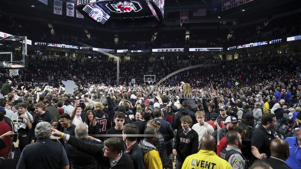 SEC fines South Carolina $100,000 for fans on the court after Kentucky win