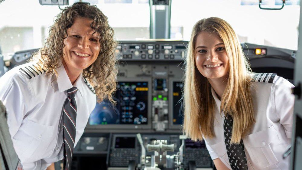 Southwest Airlines first mother-daughter pilot duo, Captain Holly Petitt (left) and First Officer Keely Petitt (right). (Photograph by Schelly Stone)