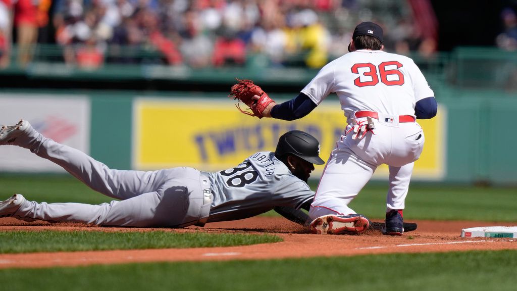 Chicago White Sox's Luis Robert Jr. (88) is picked off at first as Boston Red Sox first baseman Triston Casas (36) tags him in the first inning of a baseball game, Sunday, Sept. 8, 2024, in Boston. (AP Photo/Steven Senne)