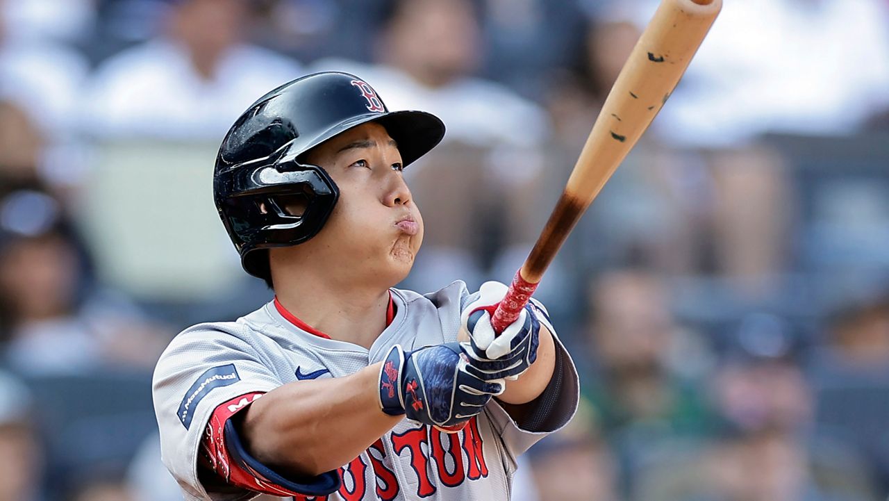 Boston Red Sox's Masataka Yoshida reacts after flying out during the eighth inning of a baseball game against the New York Yankees, Sunday, Sept. 15, 2024, in New York. (AP Photo/Adam Hunger)