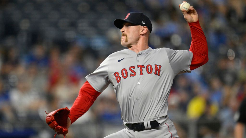 Boston Red Sox relief pitcher Cam Booser throws to a Kansas City Royals batter during the ninth inning of a baseball game against the Kansas City Royals, Monday, Aug. 5, 2024, in Kansas City, Mo. (AP Photo/Reed Hoffmann, File)