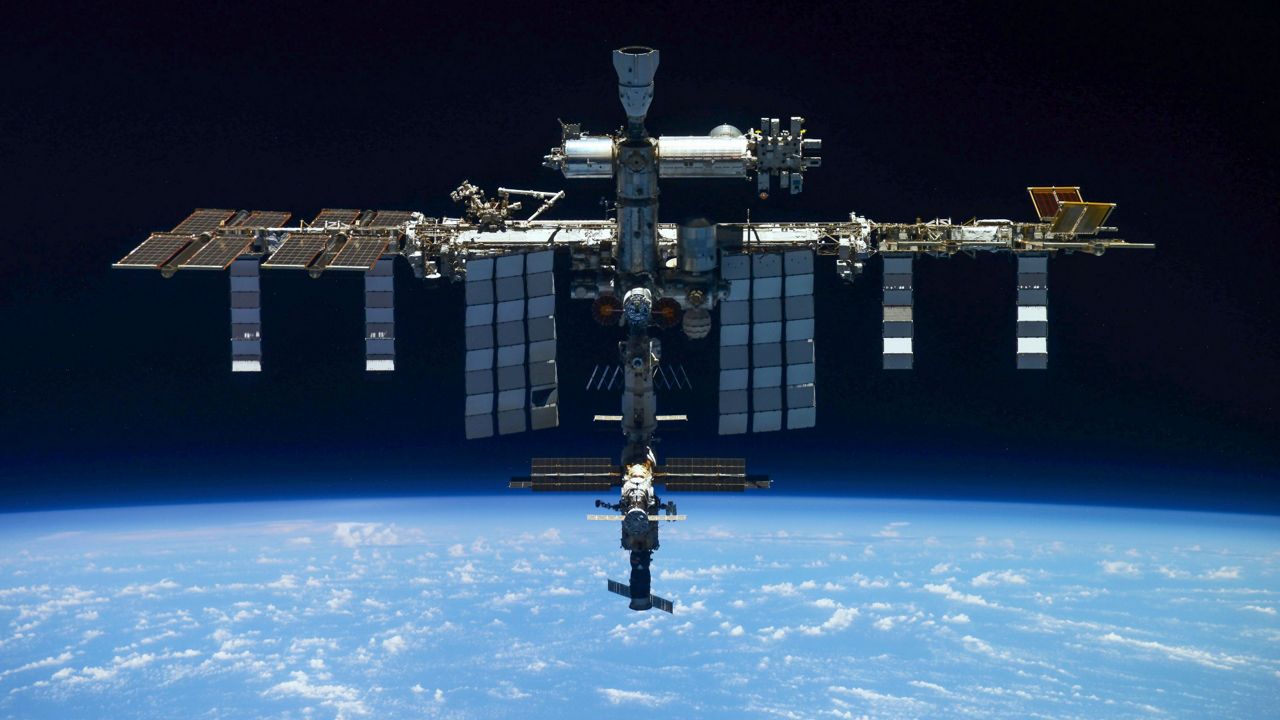 This photo released by Roscosmos Space Agency Press Service shows the International Space Station on March 30, photographed by the crew of a Russian Soyuz MS-19 spaceship after undocking from the station. (Roscosmos Space Agency Press Service via AP)