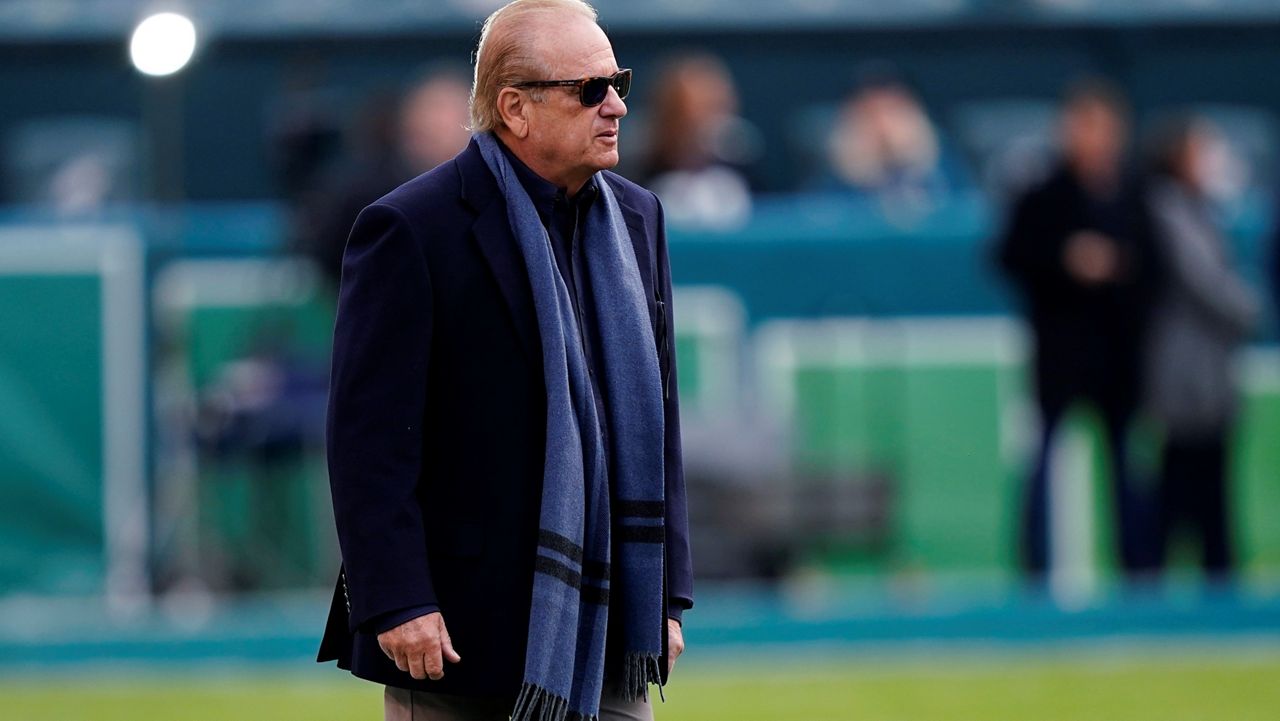 Los Angeles Chargers controlling owner Dean Spanos walks on the field before the team's NFL football game against the Philadelphia Eagles on Nov. 7, 2021, in Philadelphia. (AP Photo/Matt Rourke, File)