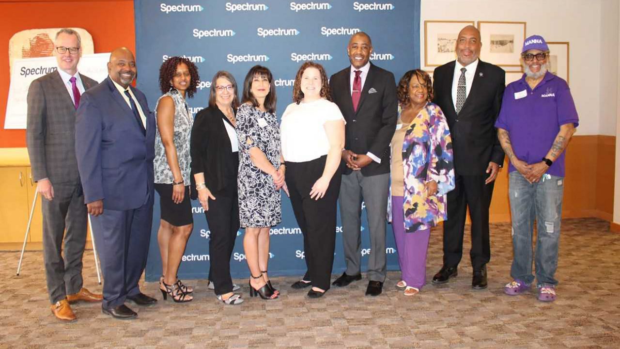 Spectrum leaders gathered at the City Club of Cleveland to recognize local recipients of the Spectrum Digital Education Grant. Several civic officials were also in attendance. (Charter Communications/ Leigh Byrd) 