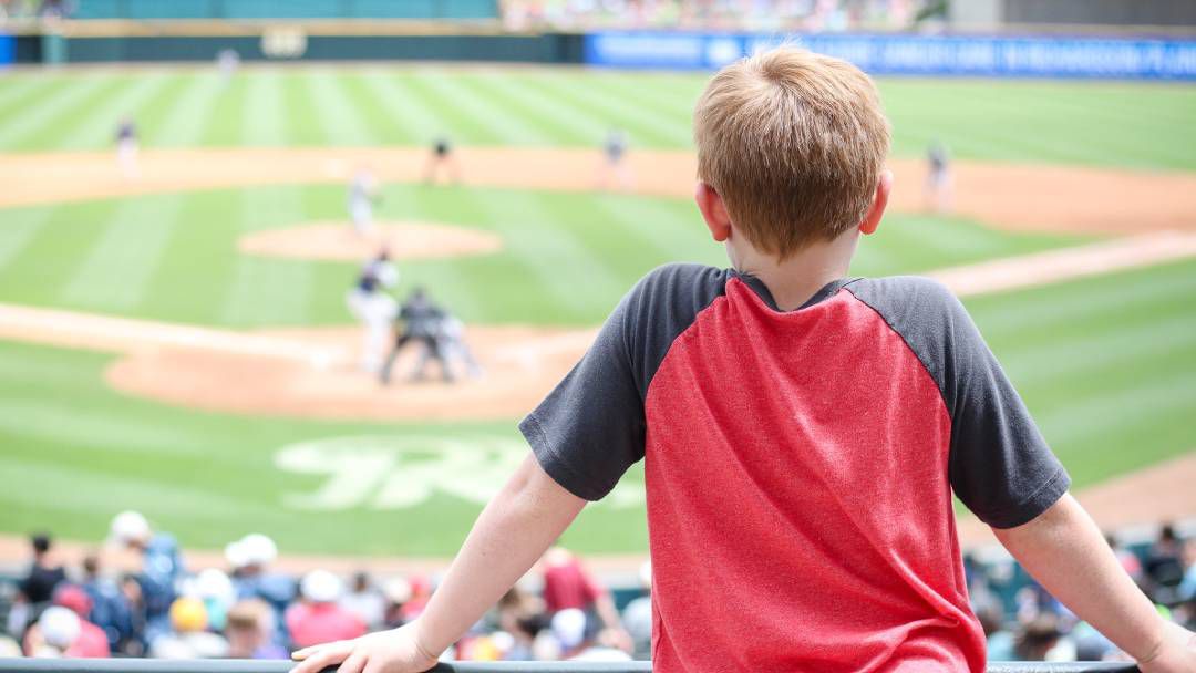 A young fan watches the Frisco RoughRiders, Texas Rangers’ double-A affiliate. This season, minor league baseball has been canceled. (Courtesy of the Frisco RoughRiders)