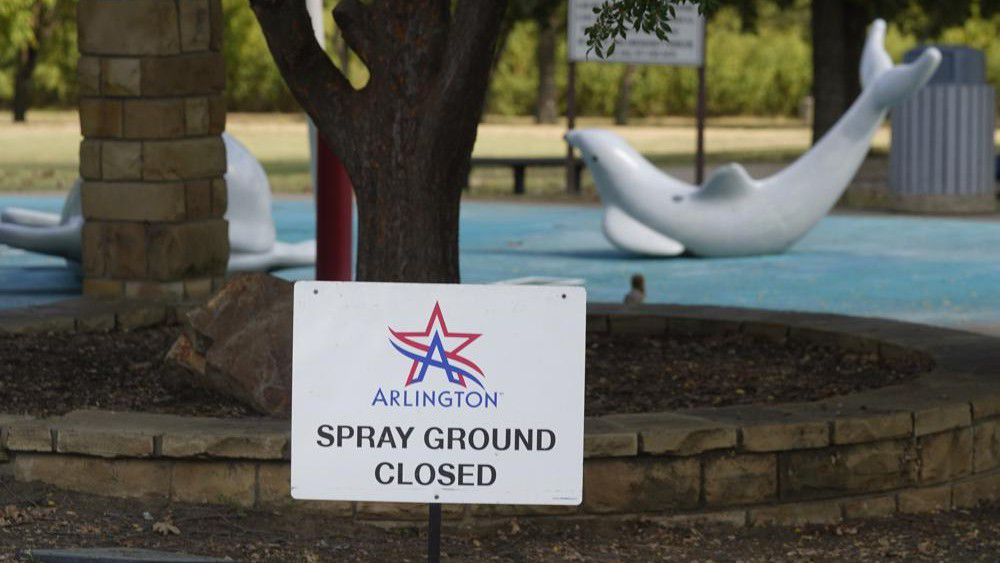 A sign states the splash pad is closed at Don Misenhimer Park where child was infected with a rare brain-eating amoeba in Arlington, Texas, Tuesday, Sept. 28, 2021. The boy, who was not identified by officials, died at the hospital on Sept. 11th and city officials said the Centers for Disease Control and Prevention confirmed the presence of the ameba in water samples from the splash pad. (AP Photo/LM Otero)