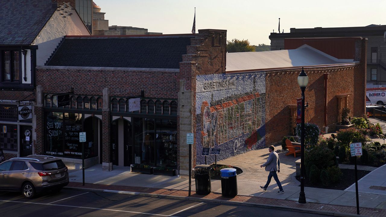 A man walks through Downtown Springfield, Ohio, Monday, Sept. 16, 2024. (AP Photo/Jessie Wardarski)