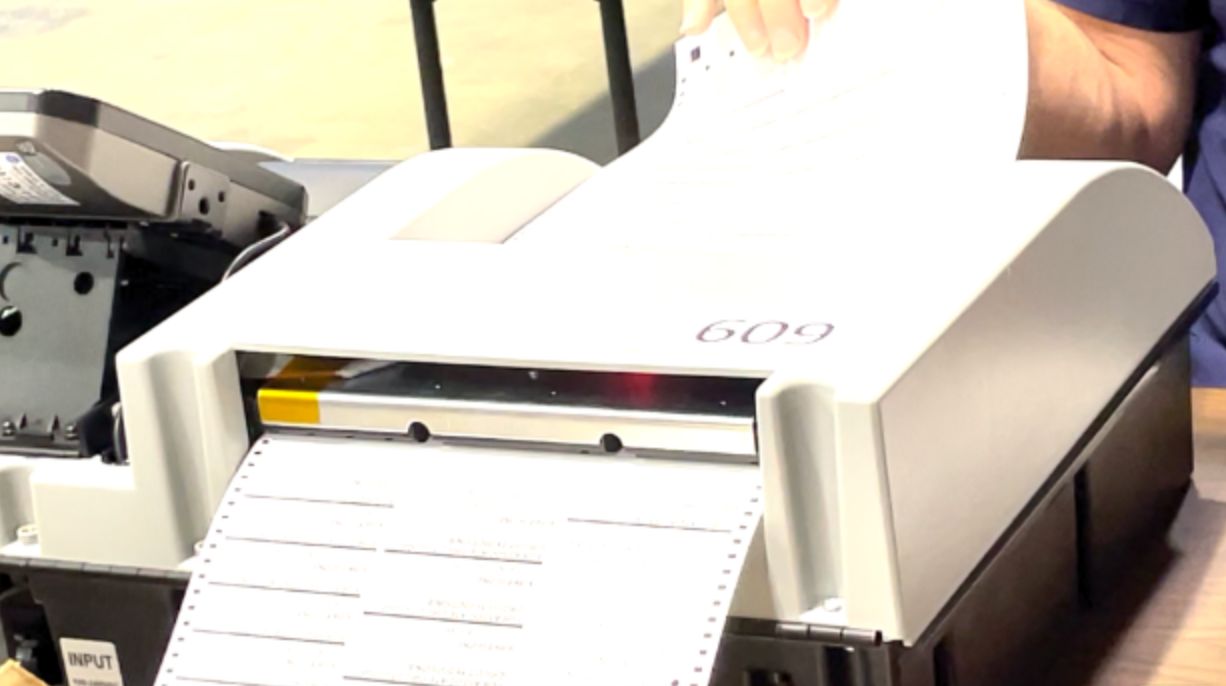 Election officials in St. Charles County run a ballot test ahead of the state's Aug. 2, 2022 primary. (Spectrum News/Gregg Palermo)
