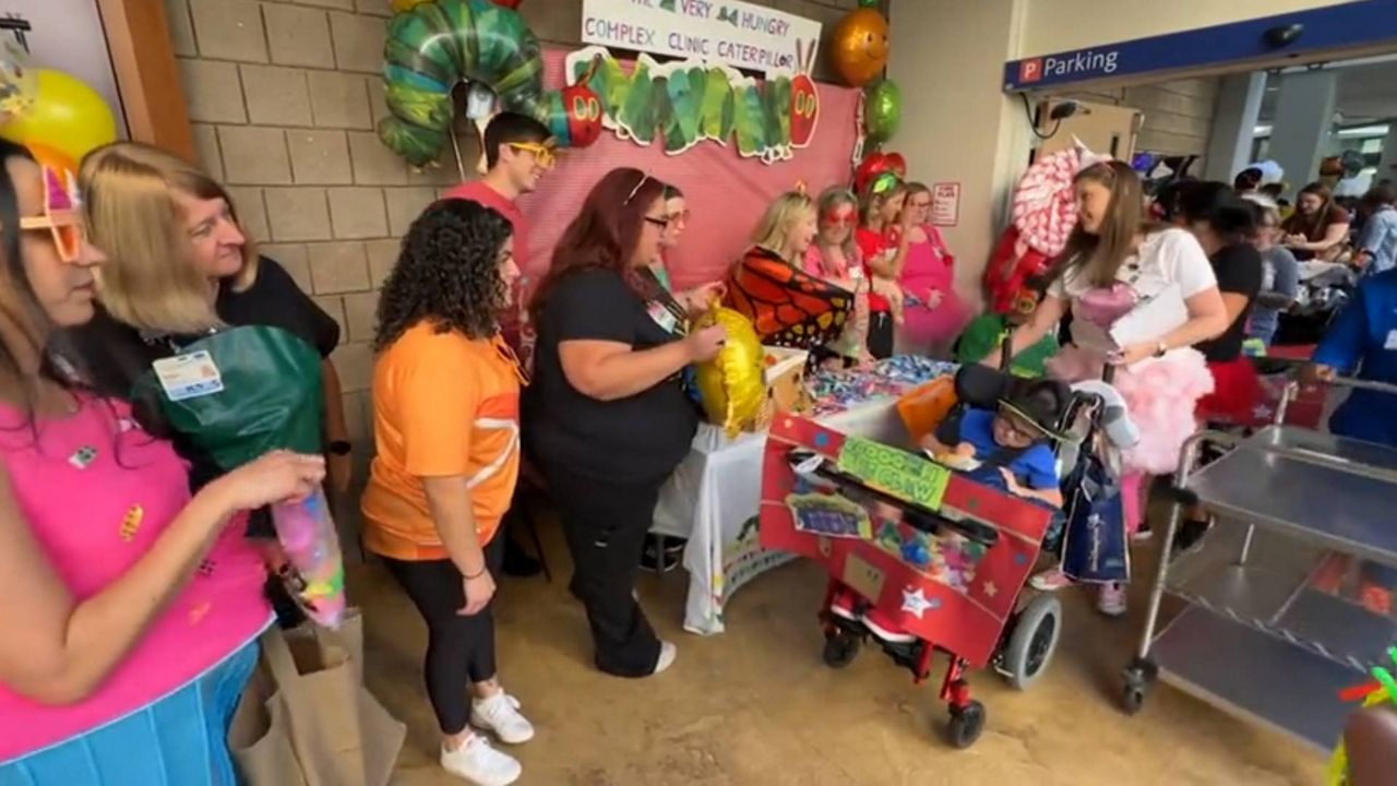 Joined by family members, pediatric patients got to do their own version of trick-or-treating during St. Joseph's Children's Hospital's annual Halloween parade. (Spectrum News)