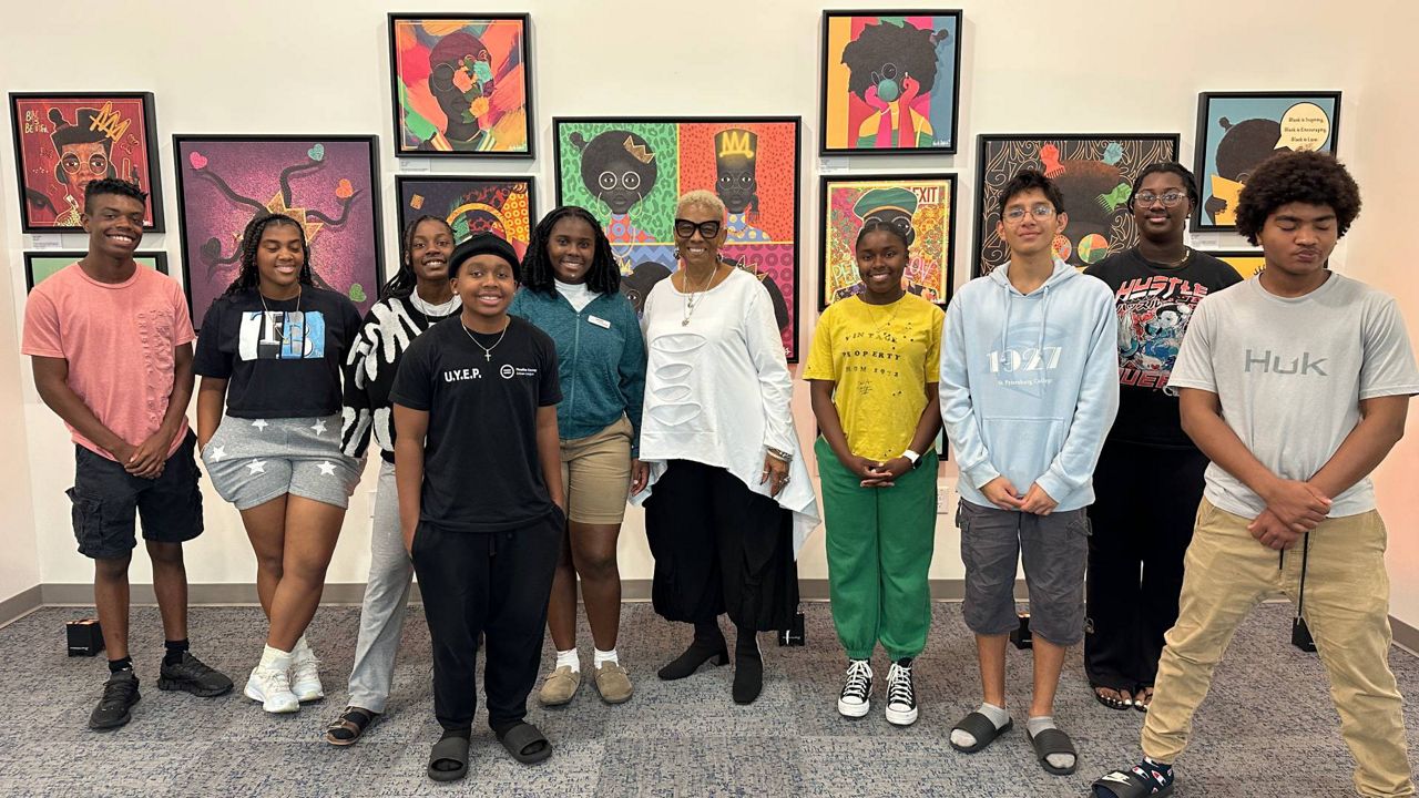The Foundation for A Healthy St. Petersburg is training a group of high school students to preserve history in a West African form of storytelling. With the help of Gwendolyn Reese (center), these students are on track to become what is known as 