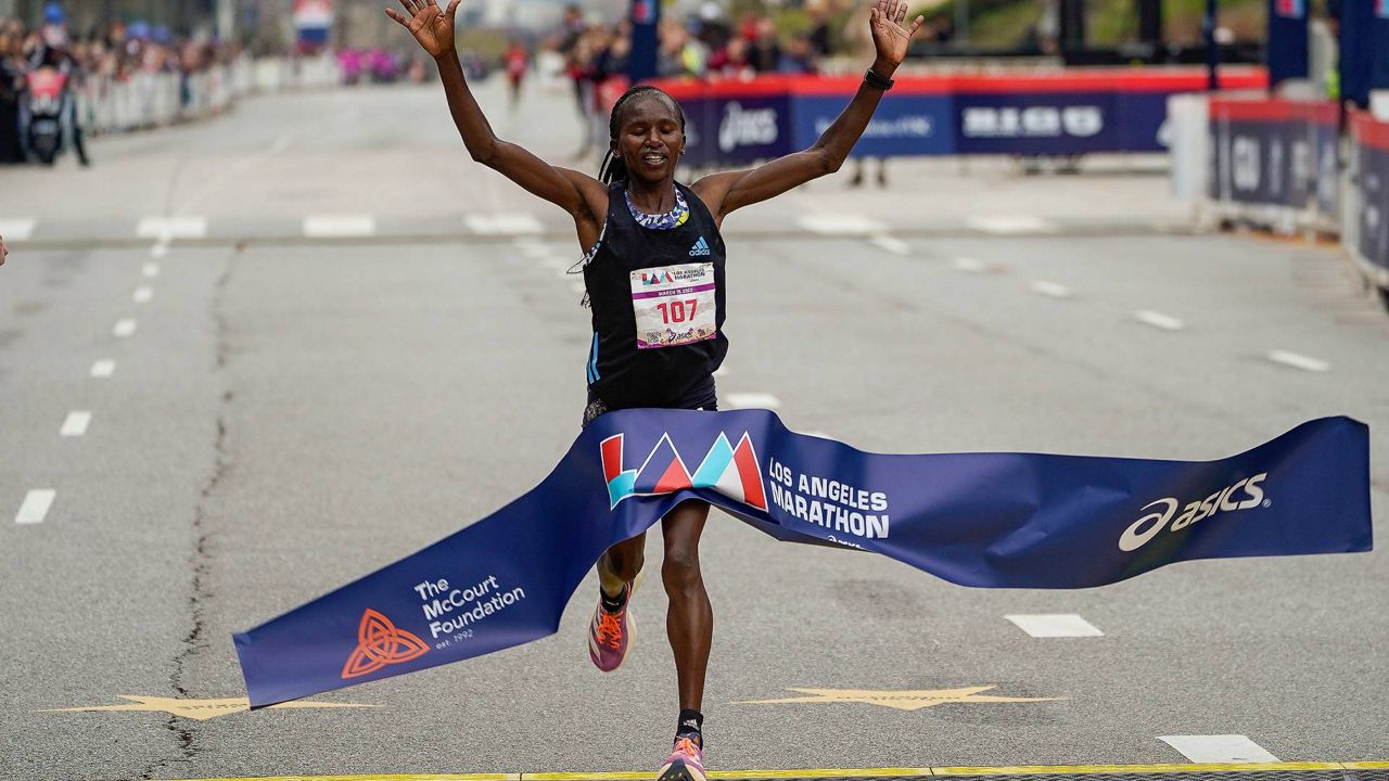 Stacy Ndiwa, of Kenya, wins the women's elite Los Angeles Marathon in Los Angeles on Sunday. (AP Photo/Damian Dovarganes)