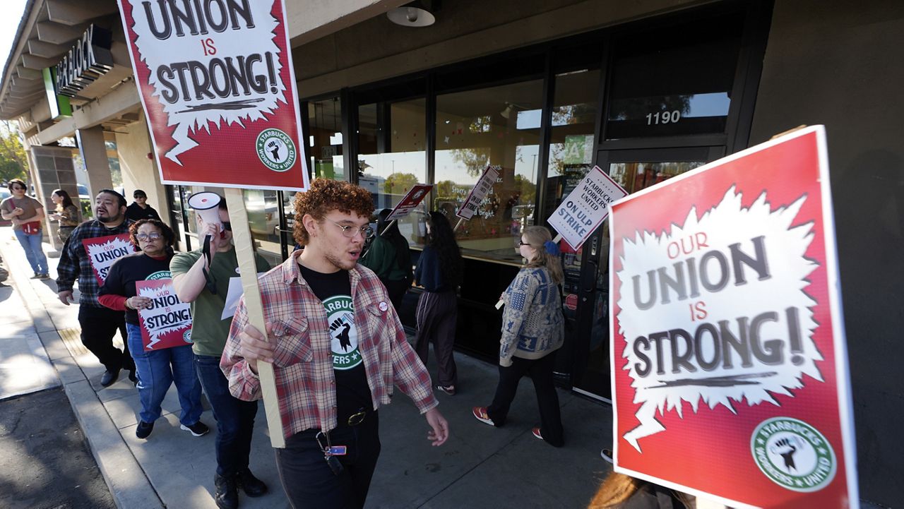 Starbuck workers picket outside of a closed Starbucks on Friday, Dec. 20, 2024, in Burbank, Calif.