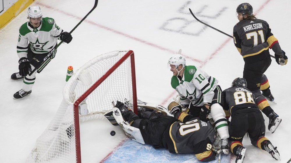 Dallas Stars' Joel Kiviranta (25) scores a goal against Vegas Golden Knights goalie Robin Lehner (90) as Stars' Corey Perry (10) and Golden Knights' Nate Schmidt (88) battle during third-period NHL Western Conference final playoff game action in Edmonton, Alberta, Monday, Sept. 14, 2020. (Jason Franson/The Canadian Press via AP