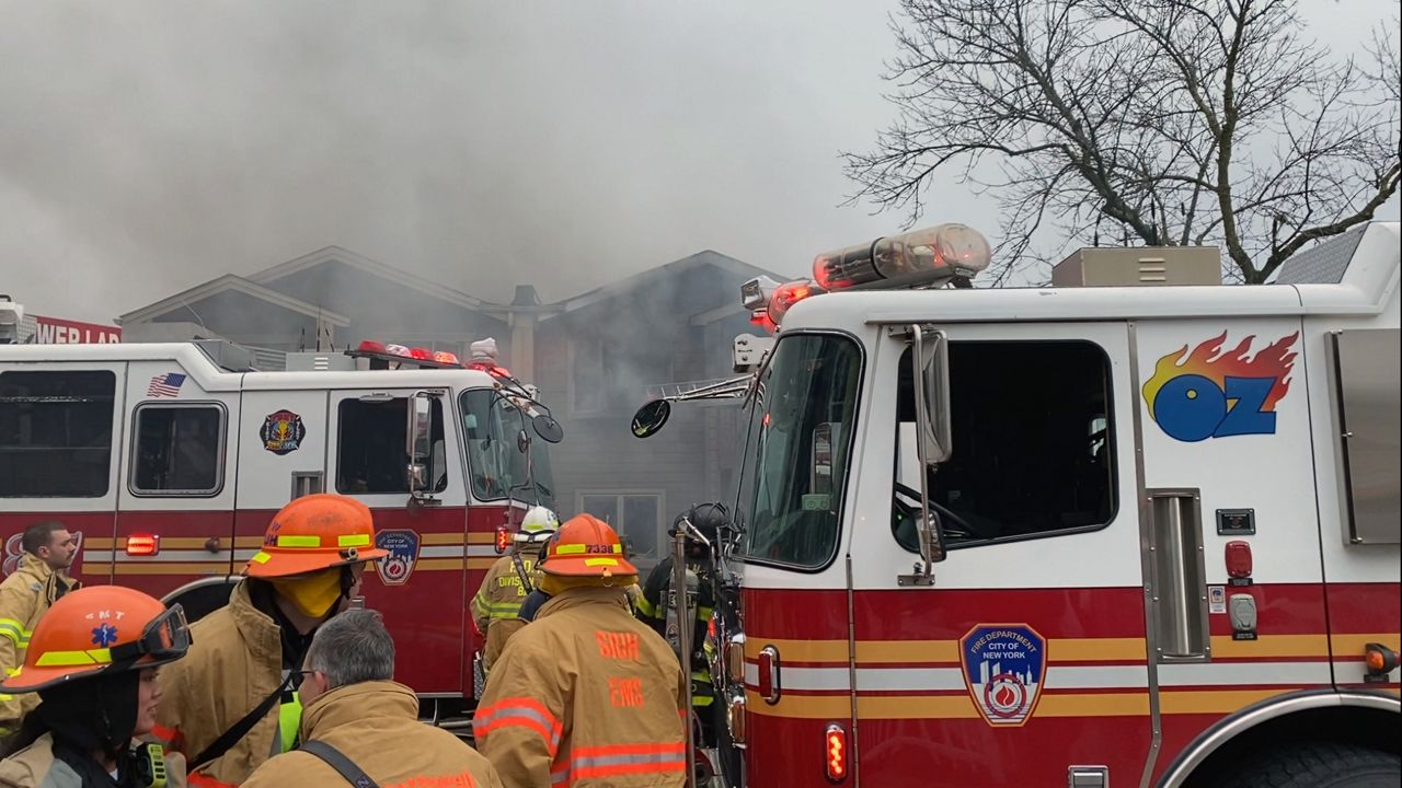 Firefighters respond to a blaze at 88 Shotwell Ave. on Staten Island on Friday, Feb. 17, 2023. (NY1/Victoria Manna)