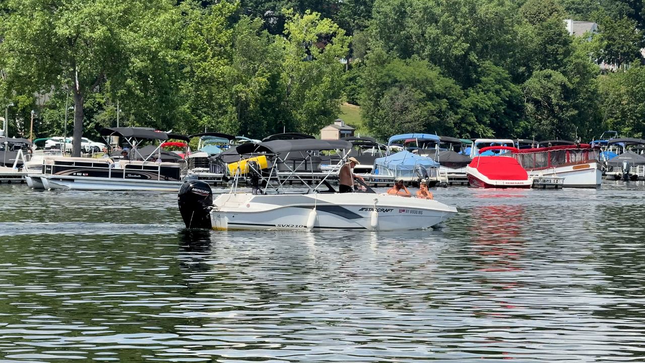 Boats are riding on Saratoga Lake.