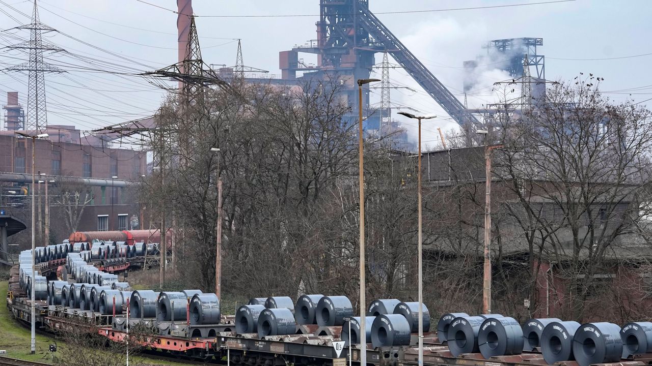 Steel on coil cars is seen ahead of transport at the main factory of struggling steel producer Thyssenkrupp in Duisburg, Germany, Tuesday, Feb. 4, 2025. (AP Photo/Martin Meissner, File)