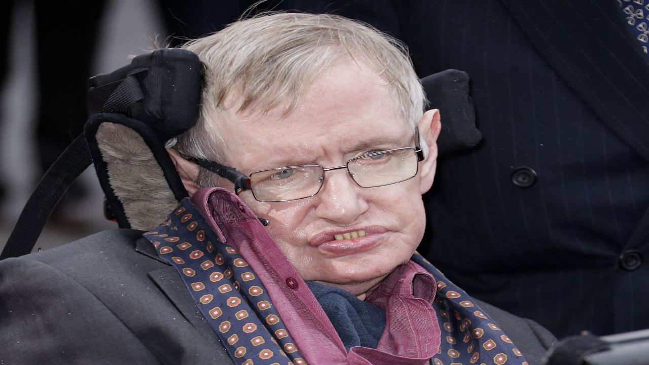 Stephen Hawking, wearing a black blazer.