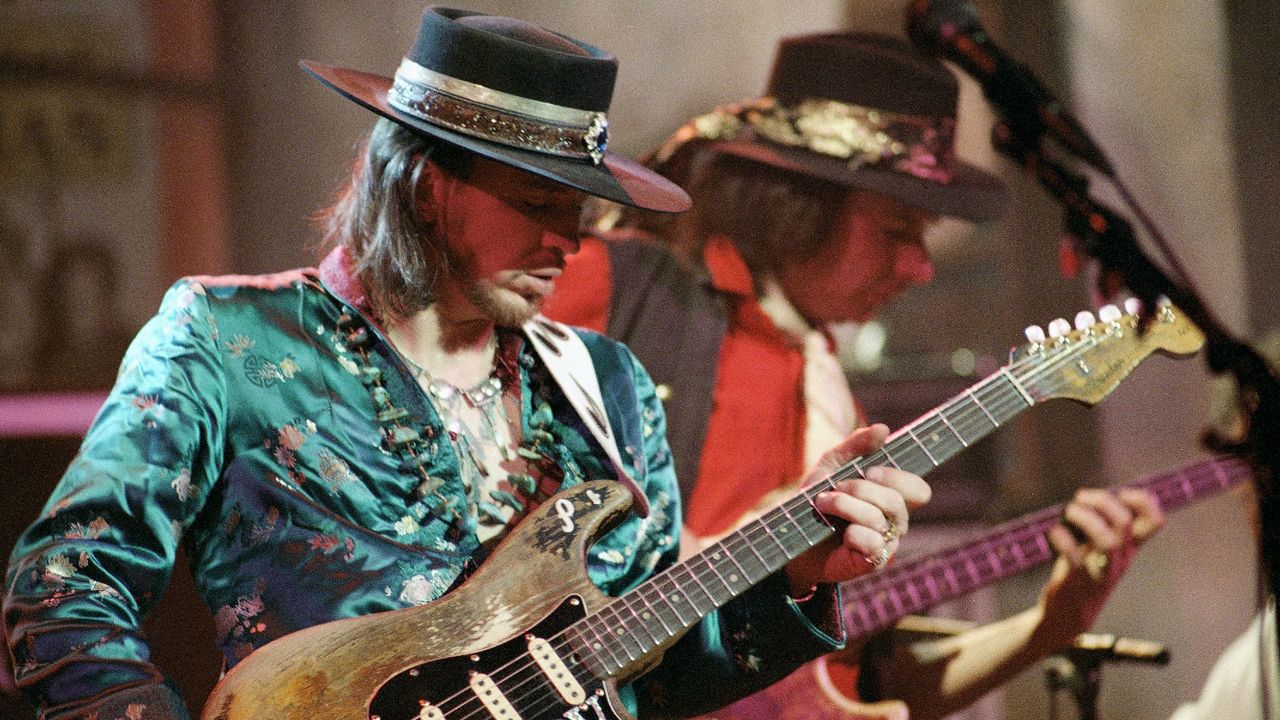 Guitarist Stevie Ray Vaughan, of Austin, Texas, left, rehearses with his band Double Trouble for a performance on Saturday Night Live, Feb. 13, 1986, New York. Bassist Tommy Shannon is at right. (AP Photo/Marty Lederhandler)