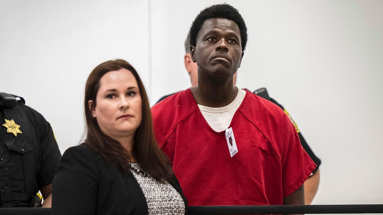 Wesley Brownlee stands with public defender Allison Nobert during his arraignment in San Joaquin County Superior Court on Tuesday, Oct. 18, 2022. Brownlee has been charged in four additional slayings this week, bringing his total to seven deaths in Northern California since April 2021, authorities said. (Hector Amezcua/The Sacramento Bee via AP,File)/The Sacramento Bee via AP, File)