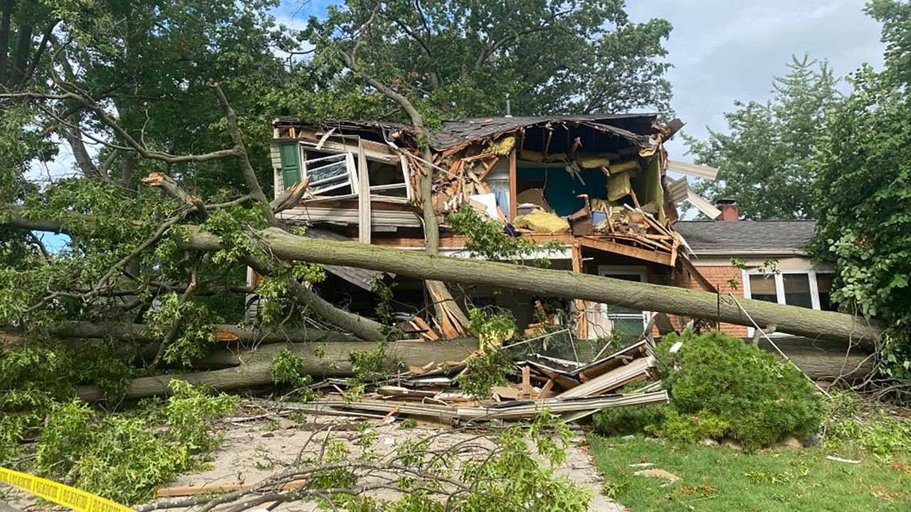 Storms on Tuesday closed down many roads due to fallen trees, downed lines and debris. (Spectrum News 1/Kristen Anzuini)