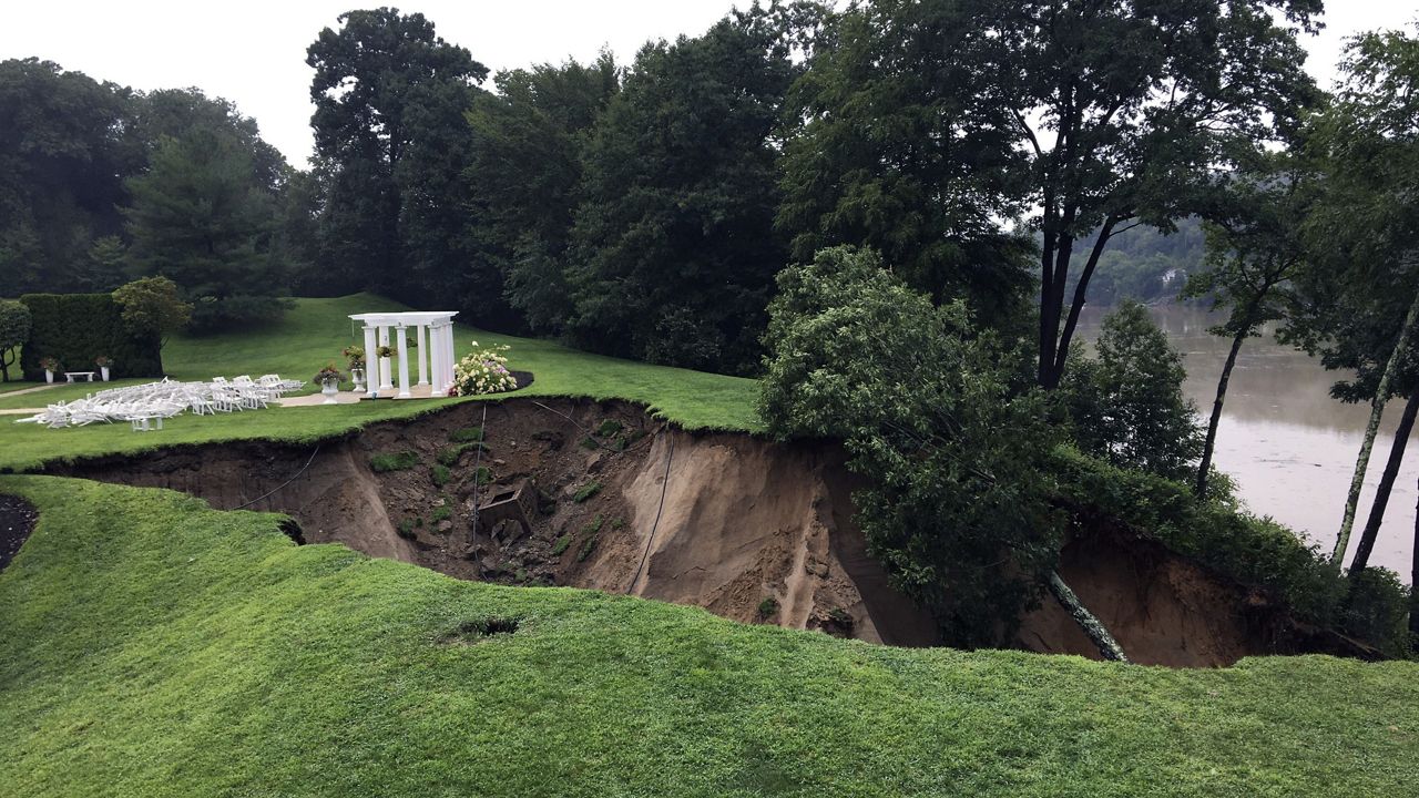 Storm damage on the grounds of The Waterview reception hall in Monroe, Conn., is shown Monday, Aug. 19, 2024. (Arnold Gold/Hearst Connecticut Media via AP)