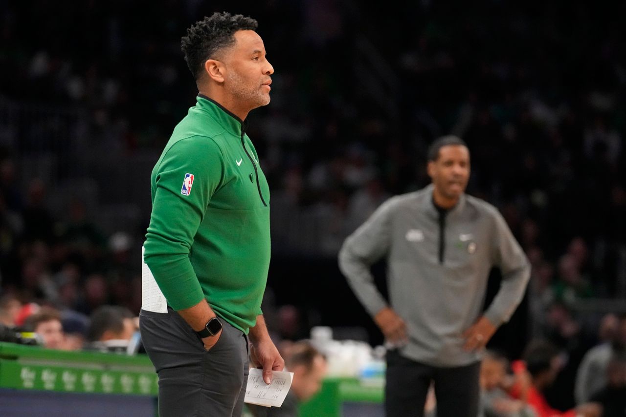Boston Celtics assistant coach Damon Stoudamire, filling in for interim head coach Joe Mazzulla, draws up a play on Dec. 27, 2022, in Boston. Stoudamire was hired Monday, March 13, 2023, as Georgia Tech's men's basketball coach. (AP Photo/Charles Krupa, File)