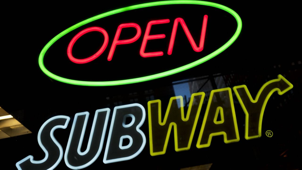 A Subway restaurant's sign is shown in New York. (AP Photo/Mark Lennihan, File)
