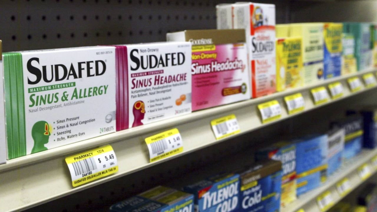 Sudafed and other common nasal decongestants containing pseudoephedrine are on display behind the counter at Hospital Discount Pharmacy in Edmond, Okla., Jan. 11, 2005. The leading decongestant used by millions of Americans looking for relief from a stuffy nose is likely no better than a dummy pill, according to government experts who reviewed the latest research on the long-questioned drug ingredient. Advisers to the Food and Drug Administration voted unanimously on Tuesday, Sept. 12, 2023 against the effectiveness of the ingredient found in popular versions of Sudafed, Allegra, Dayquil and other medications sold on pharmacy shelves. (AP Photo, File)