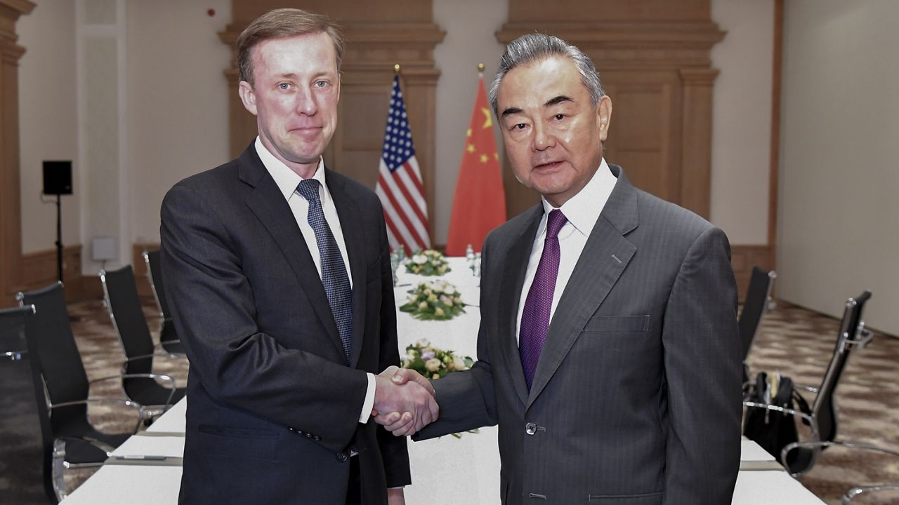 In this photo released by Xinhua News Agency, Chinese Foreign Minister Wang Yi, right, shakes hands with U.S. national security adviser Jake Sullivan in Malta on Sept. 16, 2023. (Lian Yi/Xinhua via AP) 