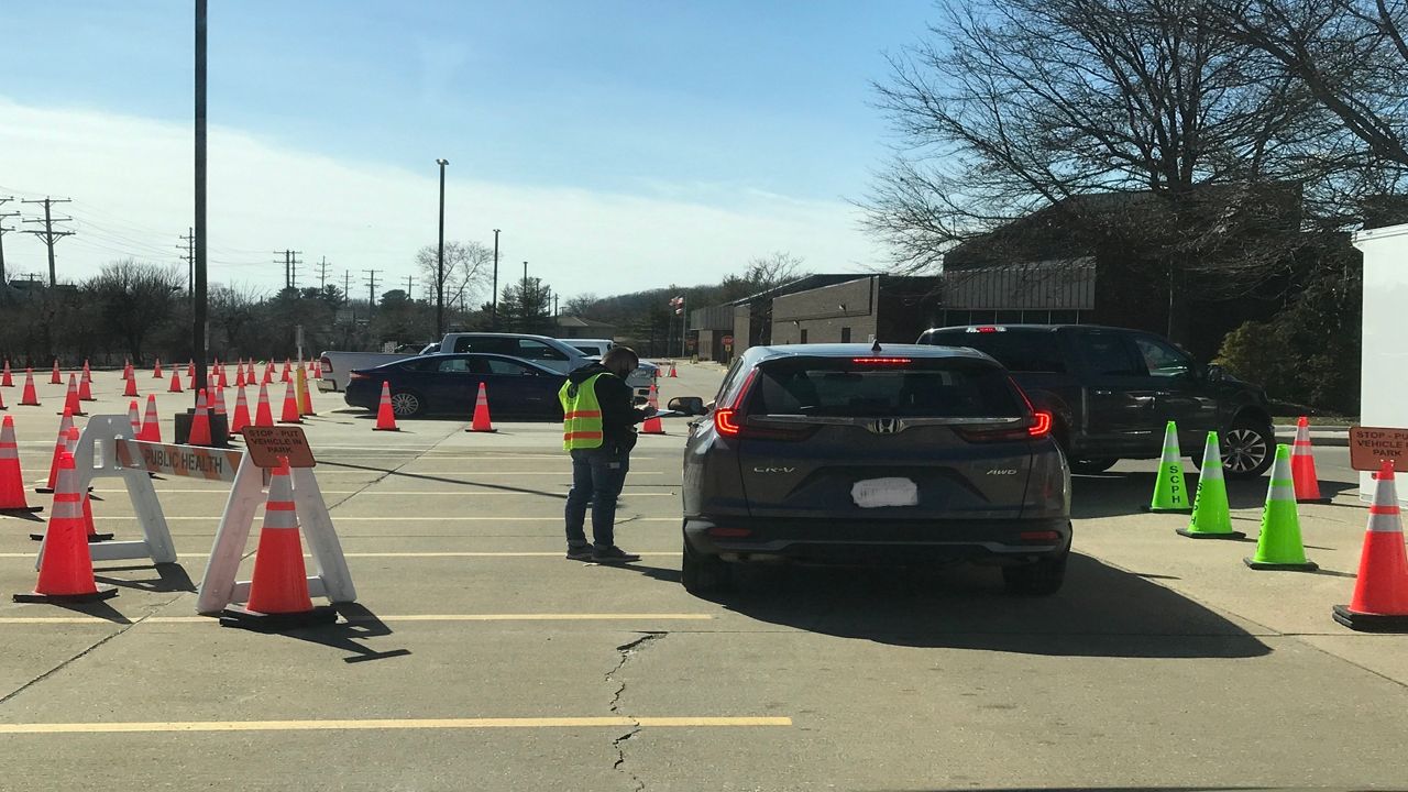 During Summit County Public Health's drive-thru booster clinic, residents can remain in their vehicles.