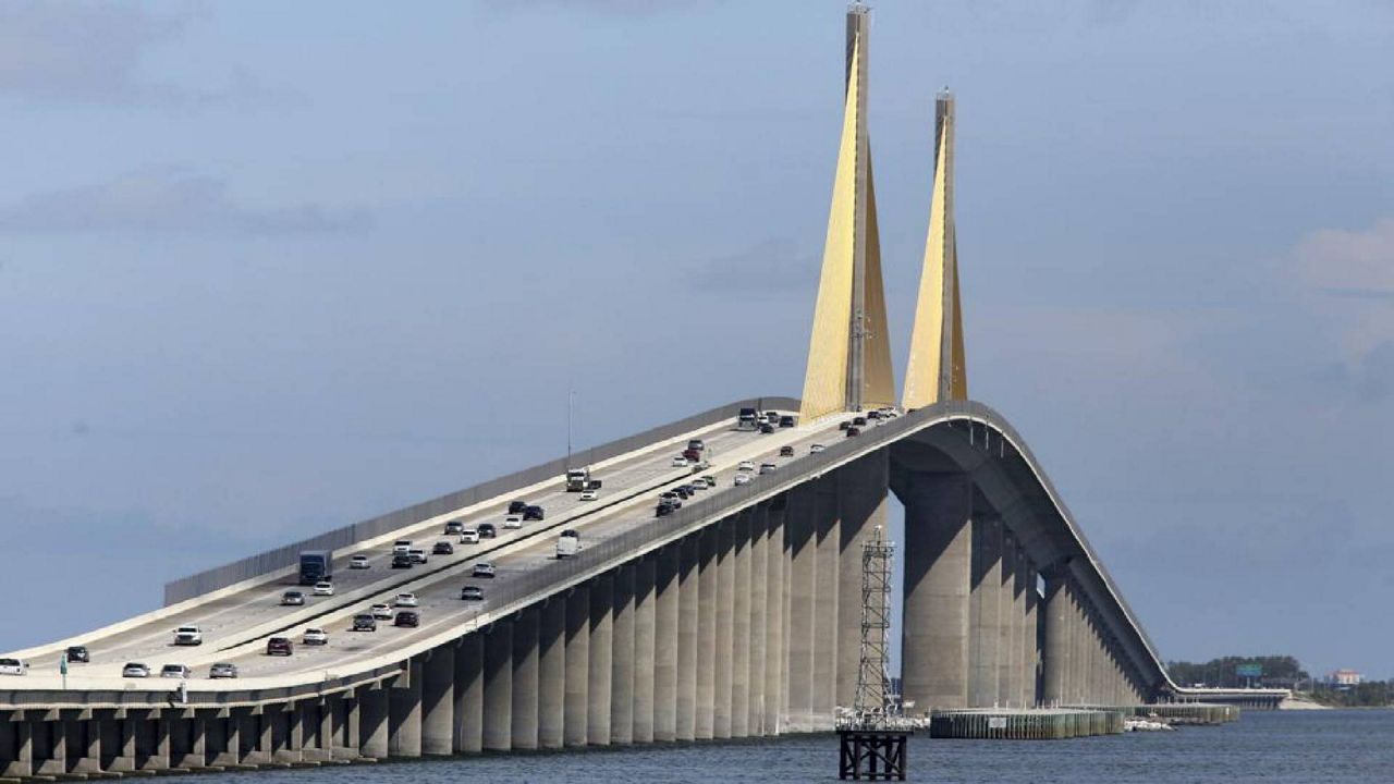 Traffic streams over the Sunshine Skyway Bridge on Wednesday, July 21, 2021, in St. Petersburg, Fla., where the new suicide prevention barrier has been completed. For decades, the Sunshine Skyway Bridge has been one of Tampa Bay’s most iconic landmarks. But the 190 foot-high peak has also drawn hundreds of people wanting to take their own life. (Douglas R. Clifford/AP)