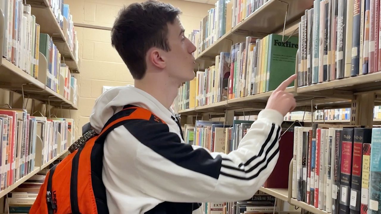 Student in library