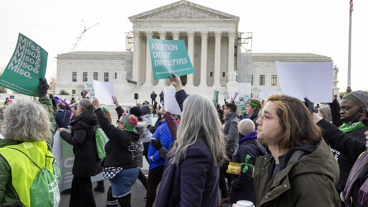 Abortion-rights groups march outside the Supreme Court, Tuesday, March 26, 2024, in Washington. (AP Photo/Amanda Andrade-Rhoades)
