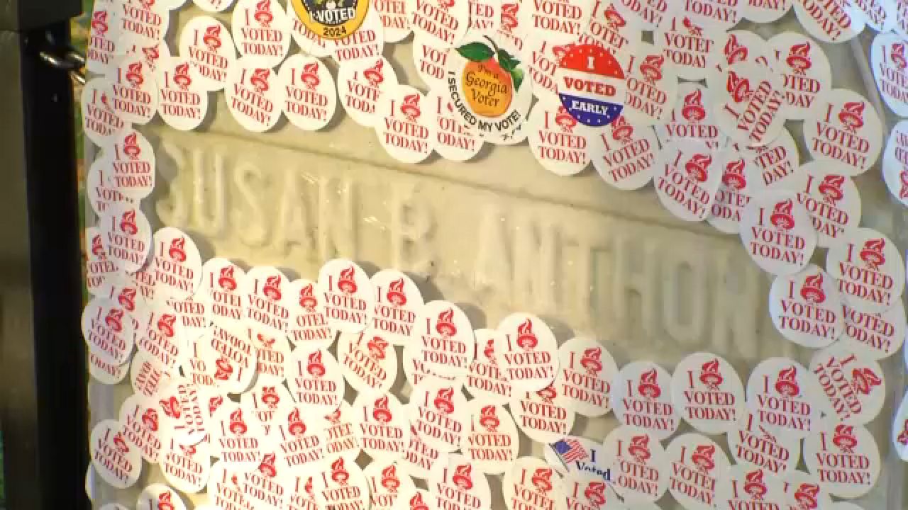 "I Voted" stickers cover the grave of women's rights Icon Susan B. Anthony at Mount Hope Cemetery in Rochester. (Spectrum News 1)