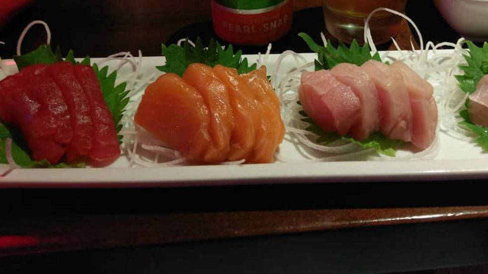 Maguro, salmon and yellow tail sushi on a plate. (Courtesy of Josh Kleinstruer)