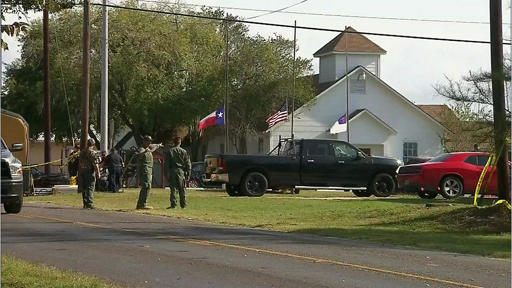 Police stand outside of Sutherland Springs First Baptist Church (Spectrum News photograph)