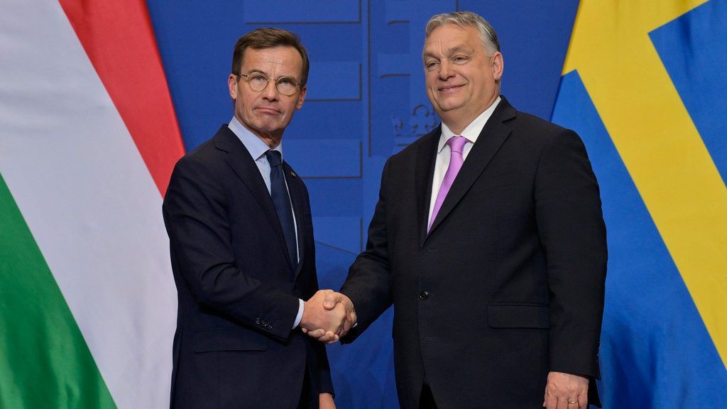 Sweden's Prime Minister Ulf Kristersson, left, shakes hands with his Hungarian counterpart Viktor Orban at the Carmelite Monastery in Budapest, Hungary, Friday, Feb 23, 2024. Nearly two years after Sweden formally applied to join NATO, its membership now hinges on convincing one country — Viktor Orban's Hungary — to formally ratify its bid to join the military alliance. (AP Photo/Denes Erdos)