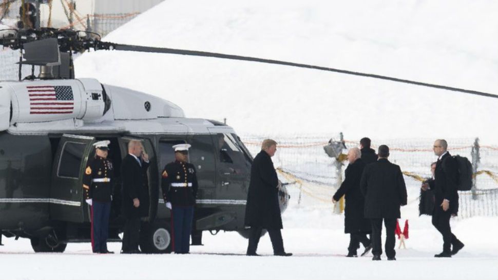 US President Donald Trump, center, leaves Marine One as he arrived for the annual meeting of the World Economic Forum, WEF, in Davos, Switzerland, Thursday, Jan. 25, 2018. (AP Photo/Gian Ehrenzeller)