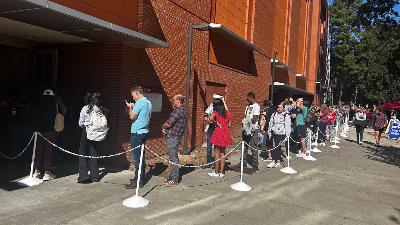 Community members and NC State students line up at Talley Student Union to cast their ballots on Oct. 22, 2024. (Spectrum News 1/Eleanor Saunders)