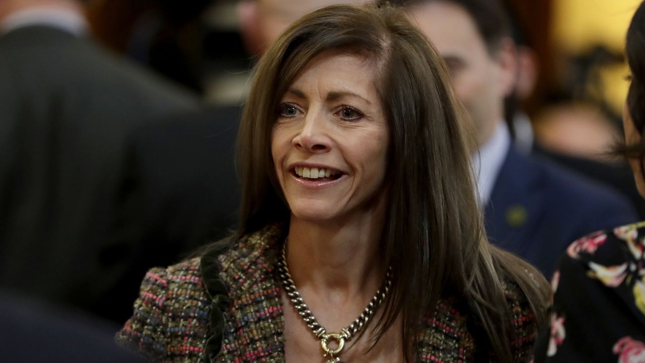 New Jersey first lady Tammy Murphy arrives at the Statehouse Assembly chambers prior to Gov. Phil Murphy's first State of the State address, Jan. 15, 2019, in Trenton, N.J. (AP Photo/Julio Cortez, File)