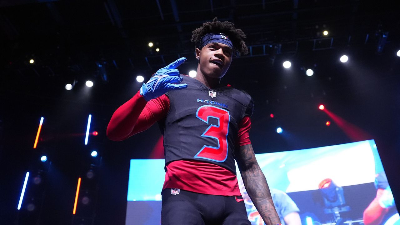 Houston Texans wide receiver Tank Dell wears a new uniform during an NFL football uniform release party, April 23, 2024, in Houston. (AP Photo/David J. Phillip, File)
