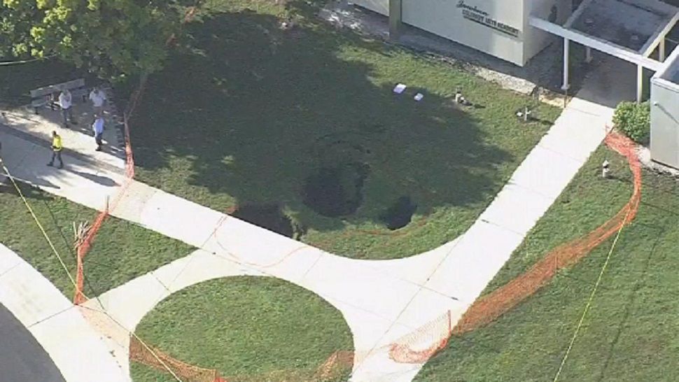 Aerial of the hole that opened up on the Tarpon Springs High School campus on Friday, May 10, 2019. (Spectrum Bay News 9)