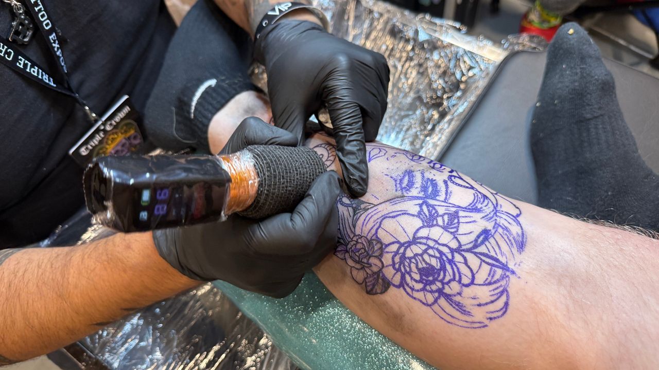 100+ artists from around the world tattoo live in Lexington