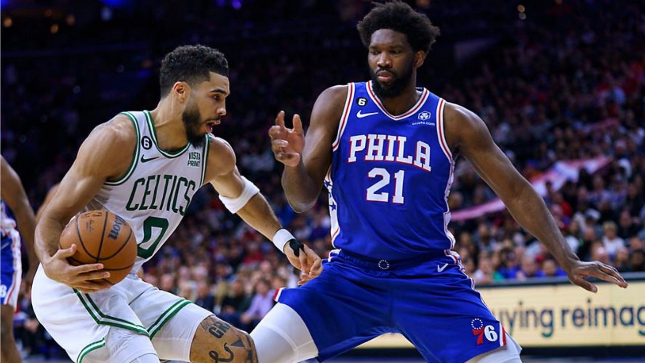 Boston Celtics' Jayson Tatum, left, makes his move to the basket against Philadelphia 76ers' Joel Embiid during the first half of an NBA basketball game Tuesday, April 4, 2023, in Philadelphia. (AP Photo/Chris Szagola)Philadelphia center Joel Embiid, pictured playing against Boston's Jayson Tatum, made the All-NBA First Team for the first time. Tatum also made the First Team. (AP Photo/Chris Szagola)