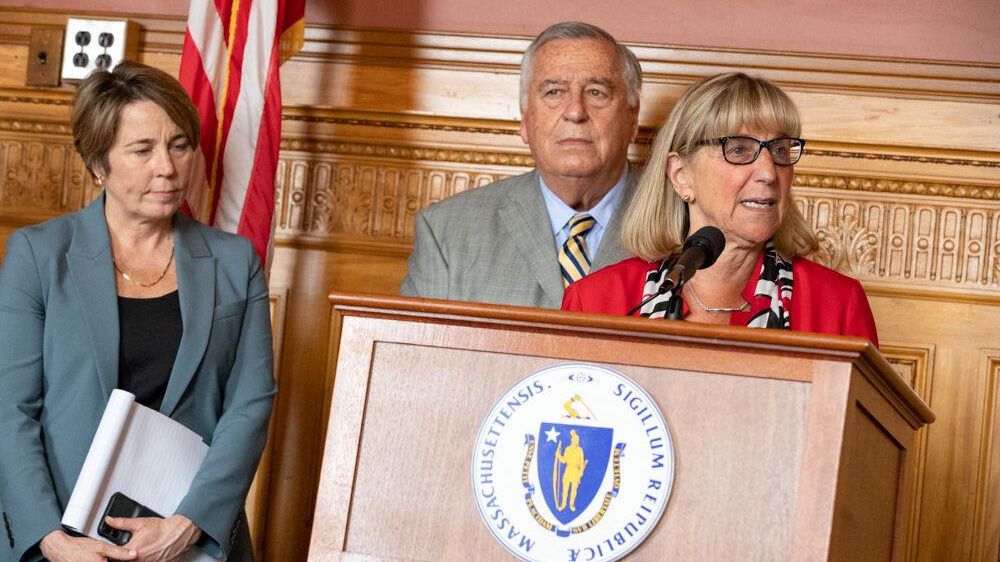 Massachusetts Senate President Karen Spilka (right), flanked by House Speaker Ron Mariano (center) and Gov. Maura Healey (left), addresses reporters after a private meeting on May 8, 2023. (State House News Service/Sam Doran)