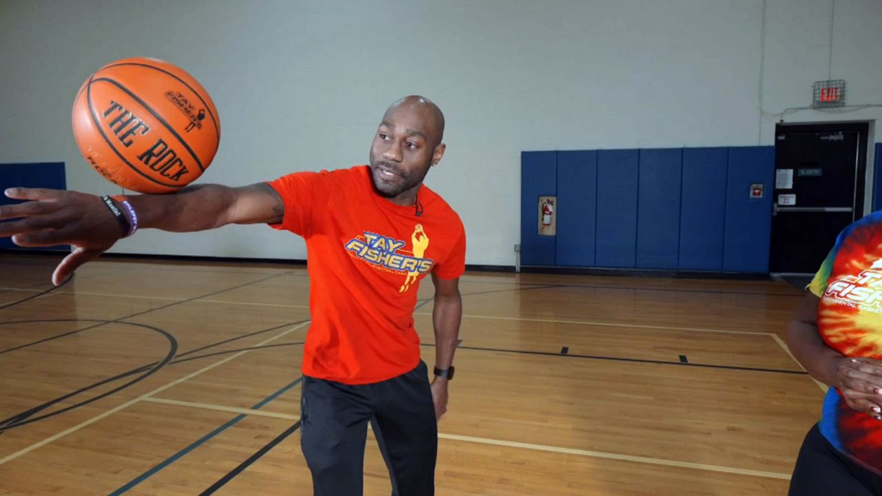 Celebrating 'World Trick Shot Day' with former Globetrotter