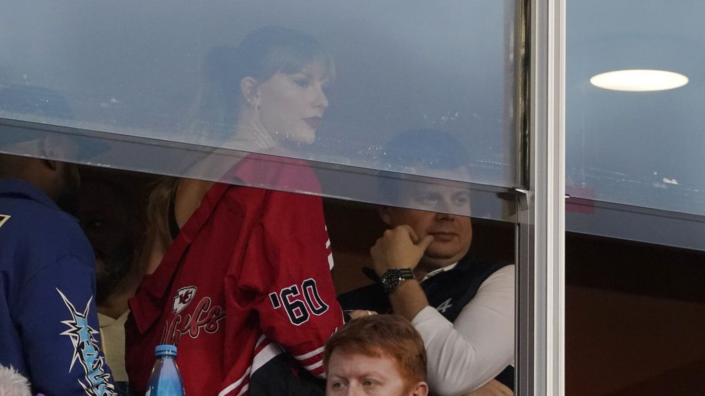 Taylor Swift waits for an NFL football game between the Kansas City Chiefs and the Denver Broncos, Thursday, Oct. 12, 2023, in Kansas City, Mo. (AP Photo/Ed Zurga)