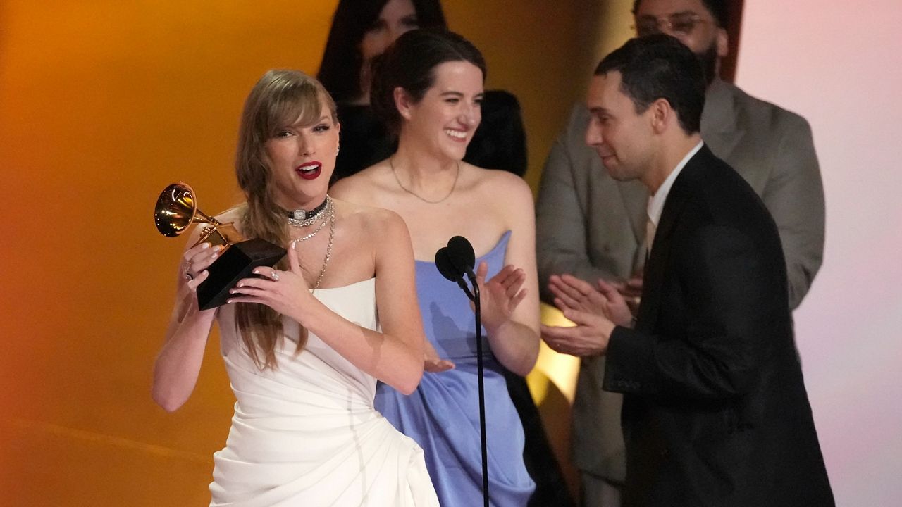 Taylor Swift accepts the award for album of the year for "MIdnights" during the 66th annual Grammy Awards on Sunday, Feb. 4, 2024. (AP Photo/Chris Pizzello)