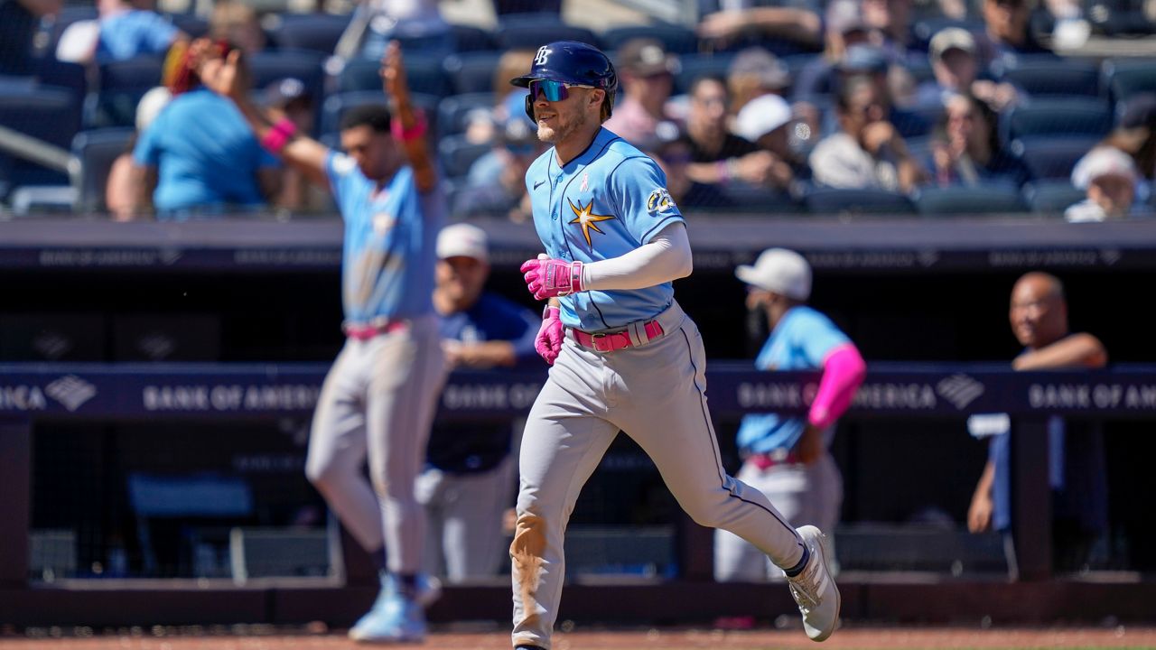 Walls tiebreaking grand slam lifts Rays over Yanks 8-7 for 4-game